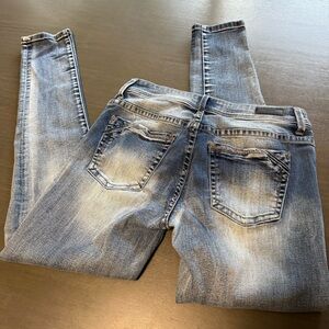 Buckle Light Wash Skinny Jeans